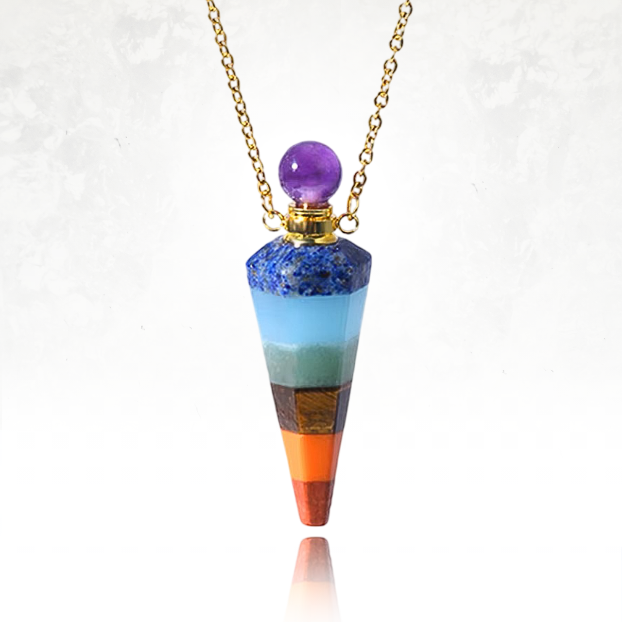 Pendentif en améthyste taillée, idéal pour huiles essentielles et parfums.