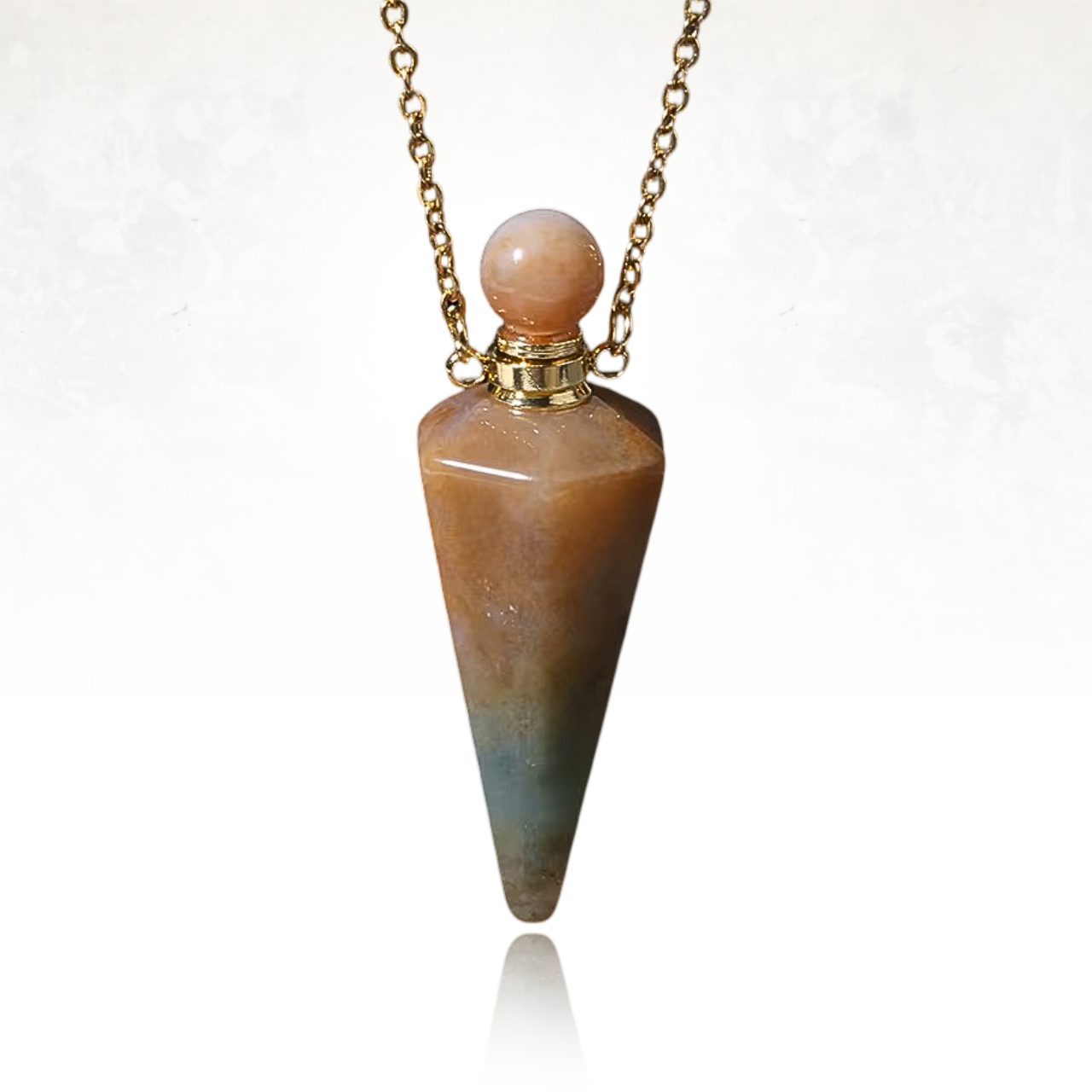 Pendentif diffuseur en cristal poli d'agate indienne, bijou tendance et fonctionnel.