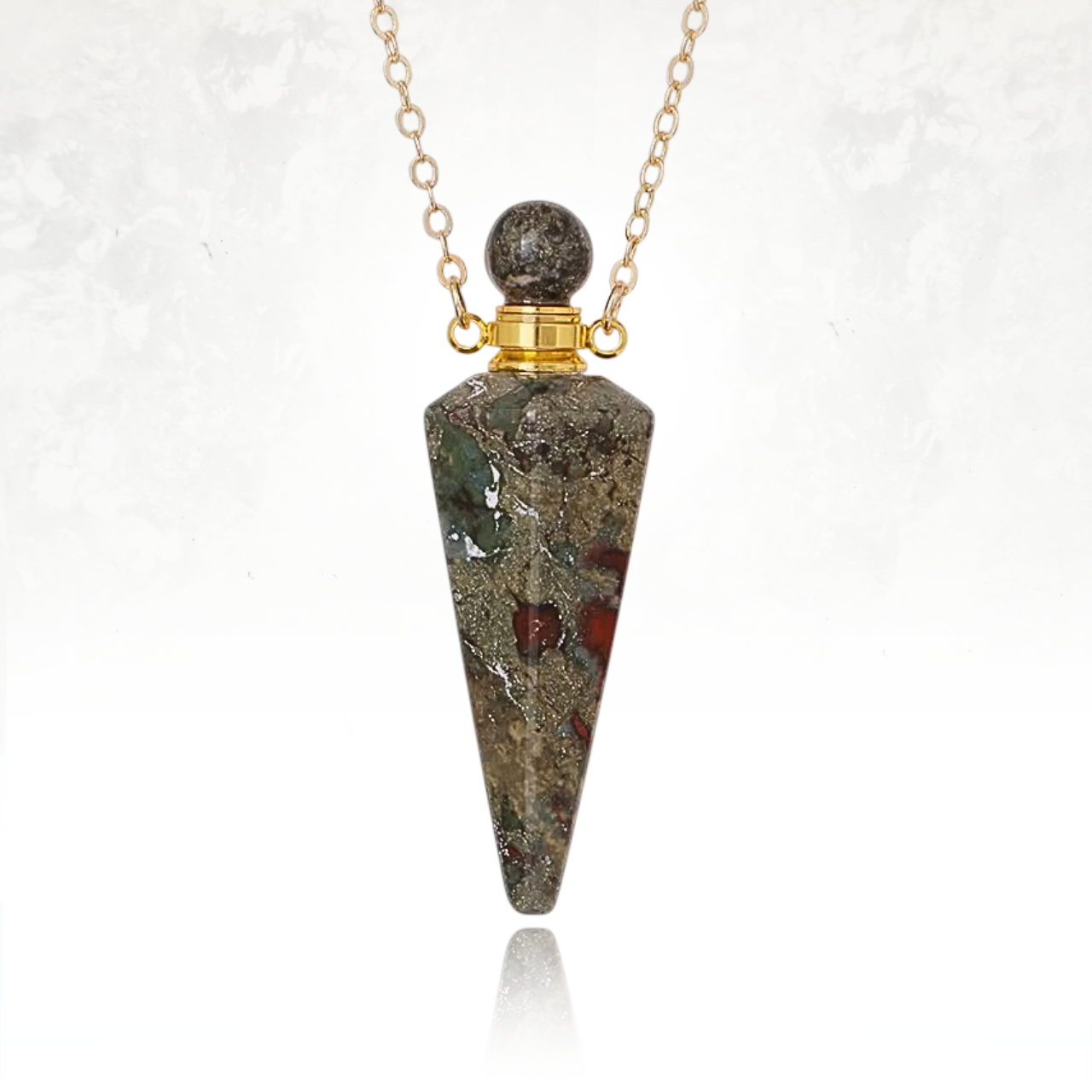 Fiole parfumée en jaspe sang de dragon, accessoire chic et bien-être.