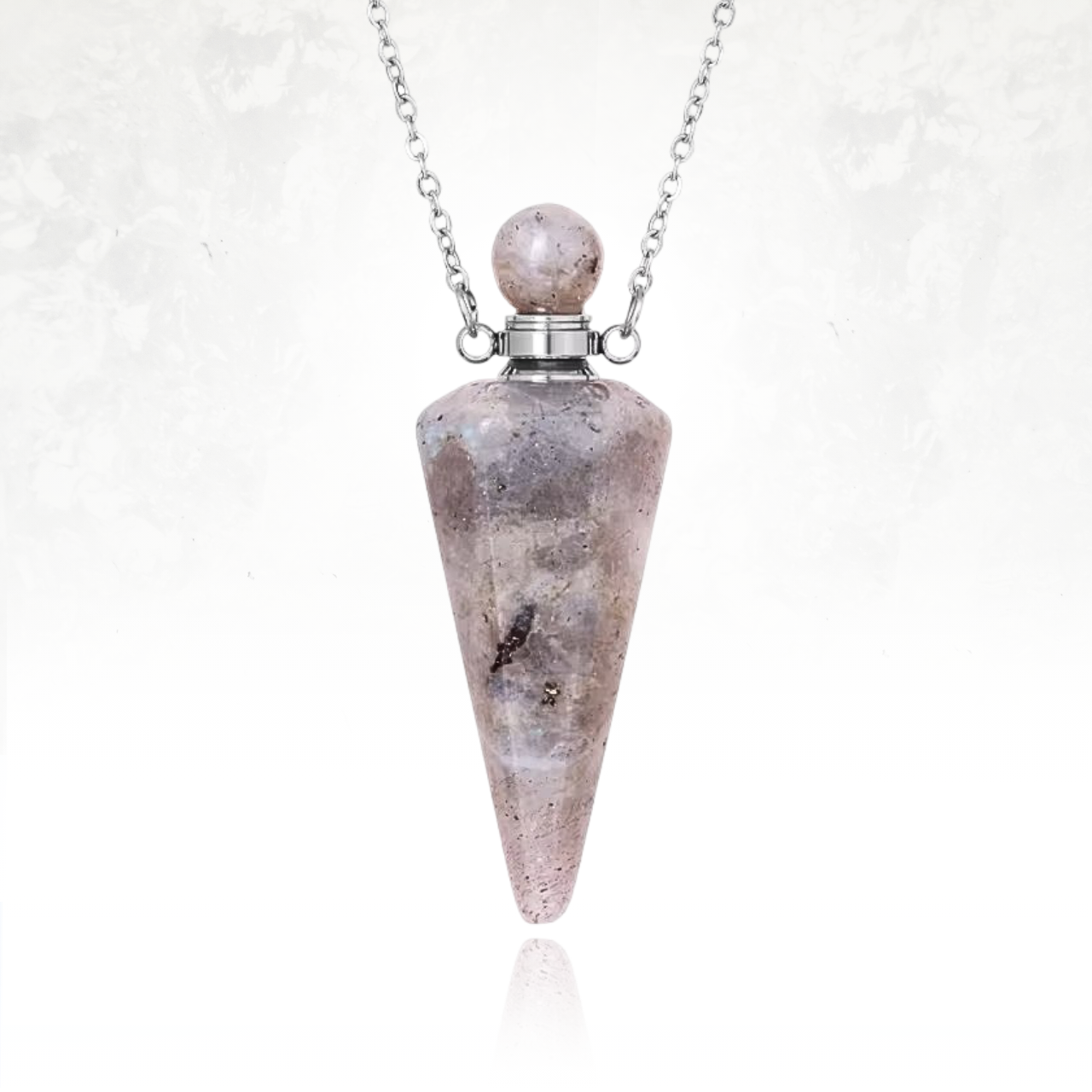 Bijou en pierre semi-précieuse de spectrolite avec réservoir pour essences naturelles.