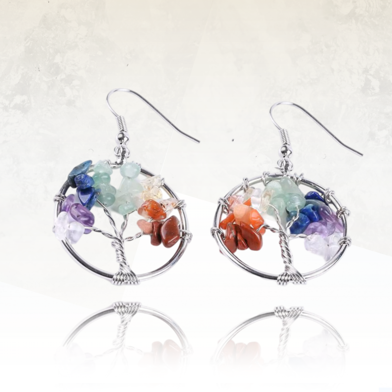 boucle sd'oreilles représentant un arbre aux branches déployées conçu en fil metallique surmonté de pierres naturelles de différentes couleurs