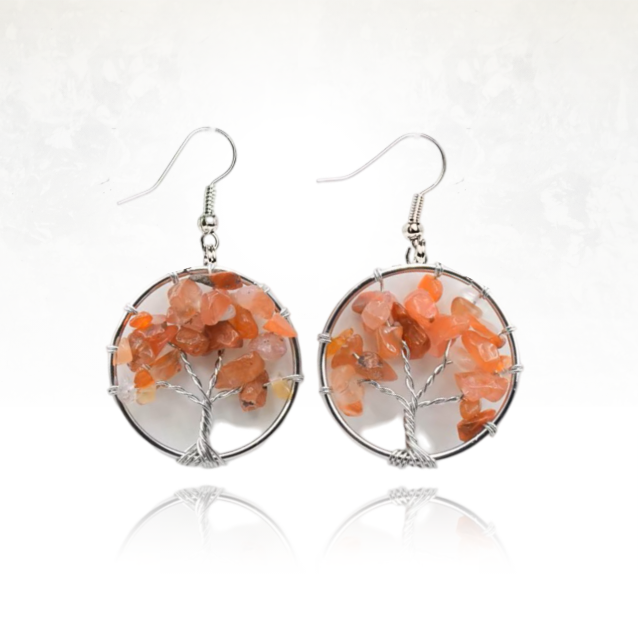 paire de boucles d'oreille en agate rouge et en fil métaliique tressé