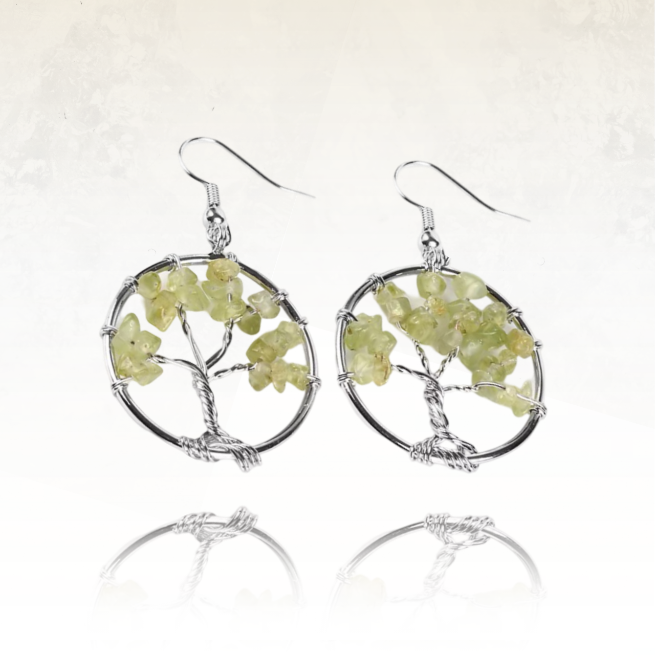 boucles d'oreilles en olivine de forme ronde avec au arbre au centre