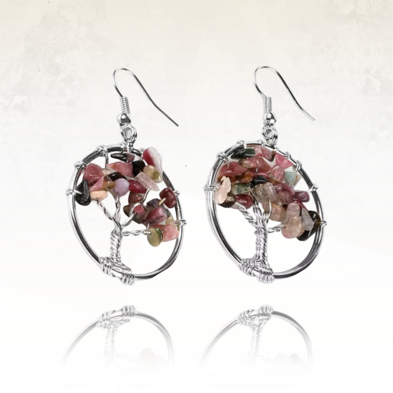 Boucles d'oreilles en Tourmaline, composé de plusieurses petites perles en pierre naturelle, cgacune reflétant les nuances de la tourmaline allant du rose au bleu