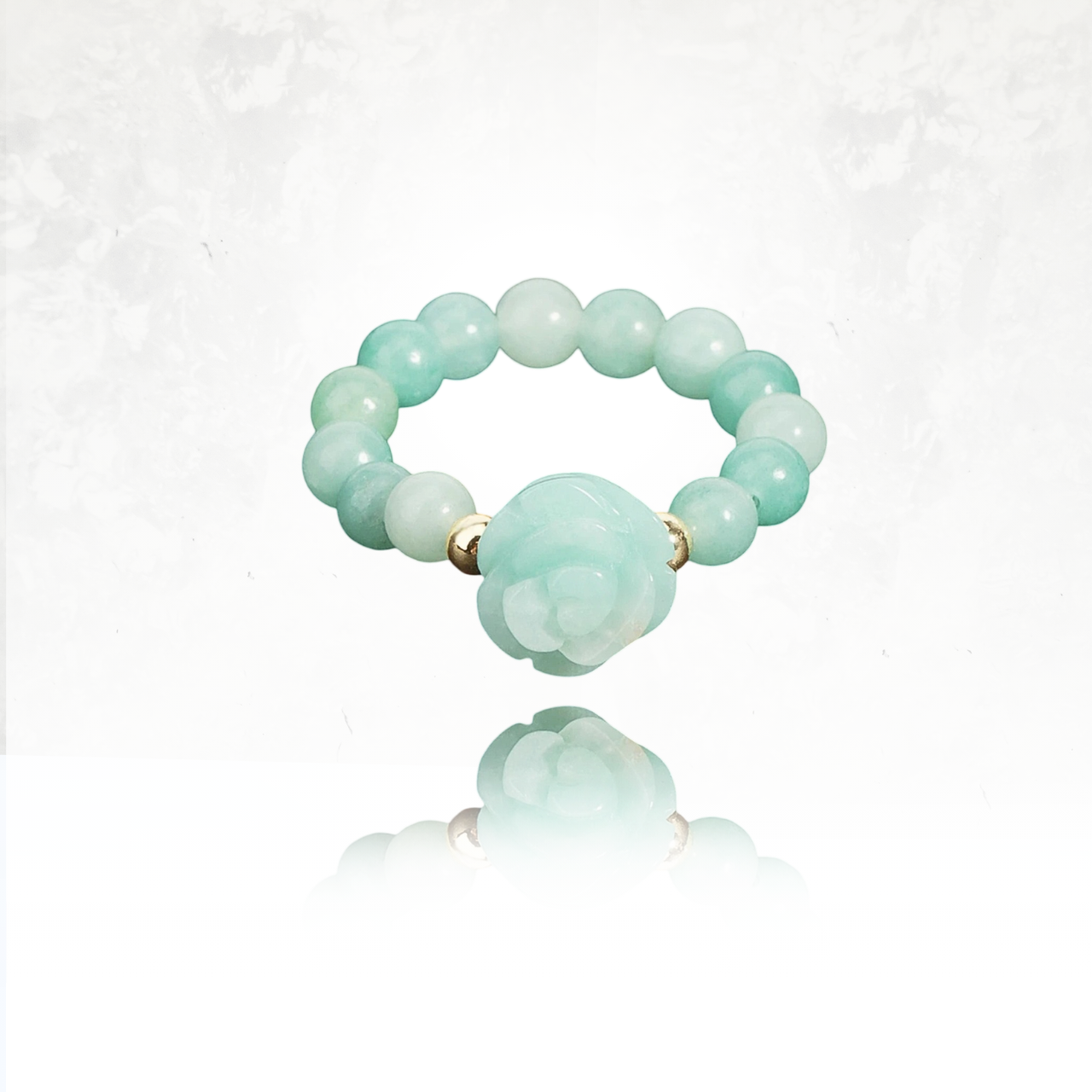 FEMINA â Un anneau en pierre naturelle ornĂ© dâune rose sculptĂ©e, un bijou intemporel en amazonite
