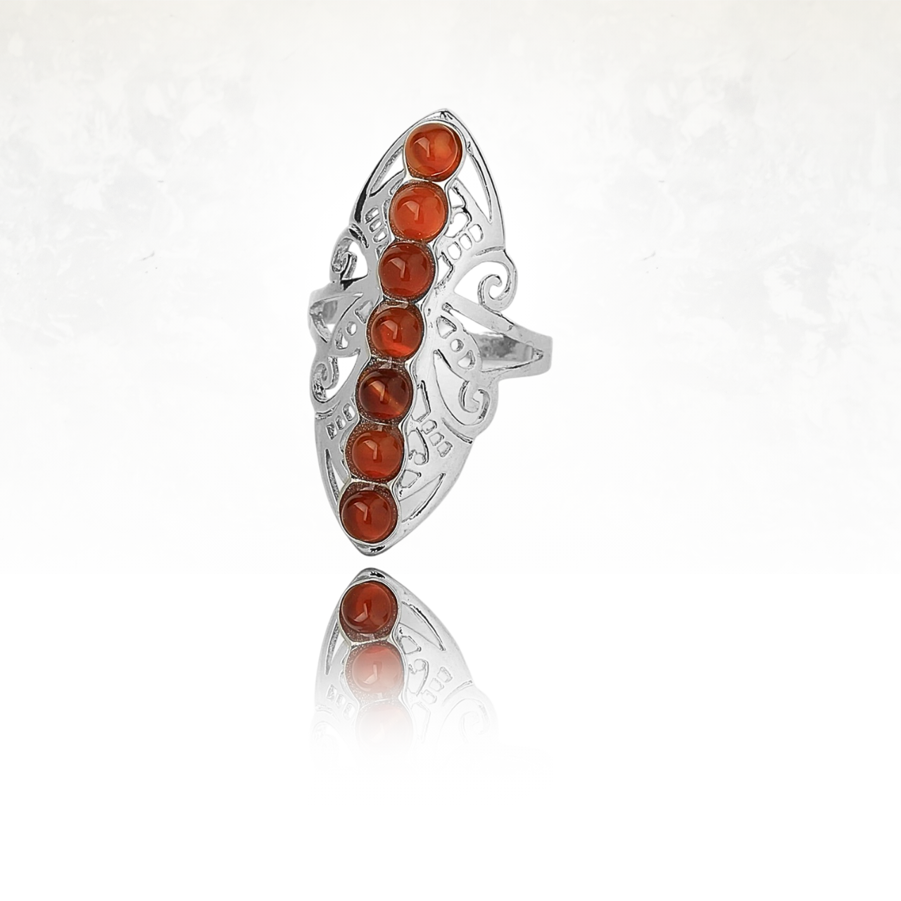 Bague artisanale longue, ajourée, avec pierres naturelles d'agate rouge