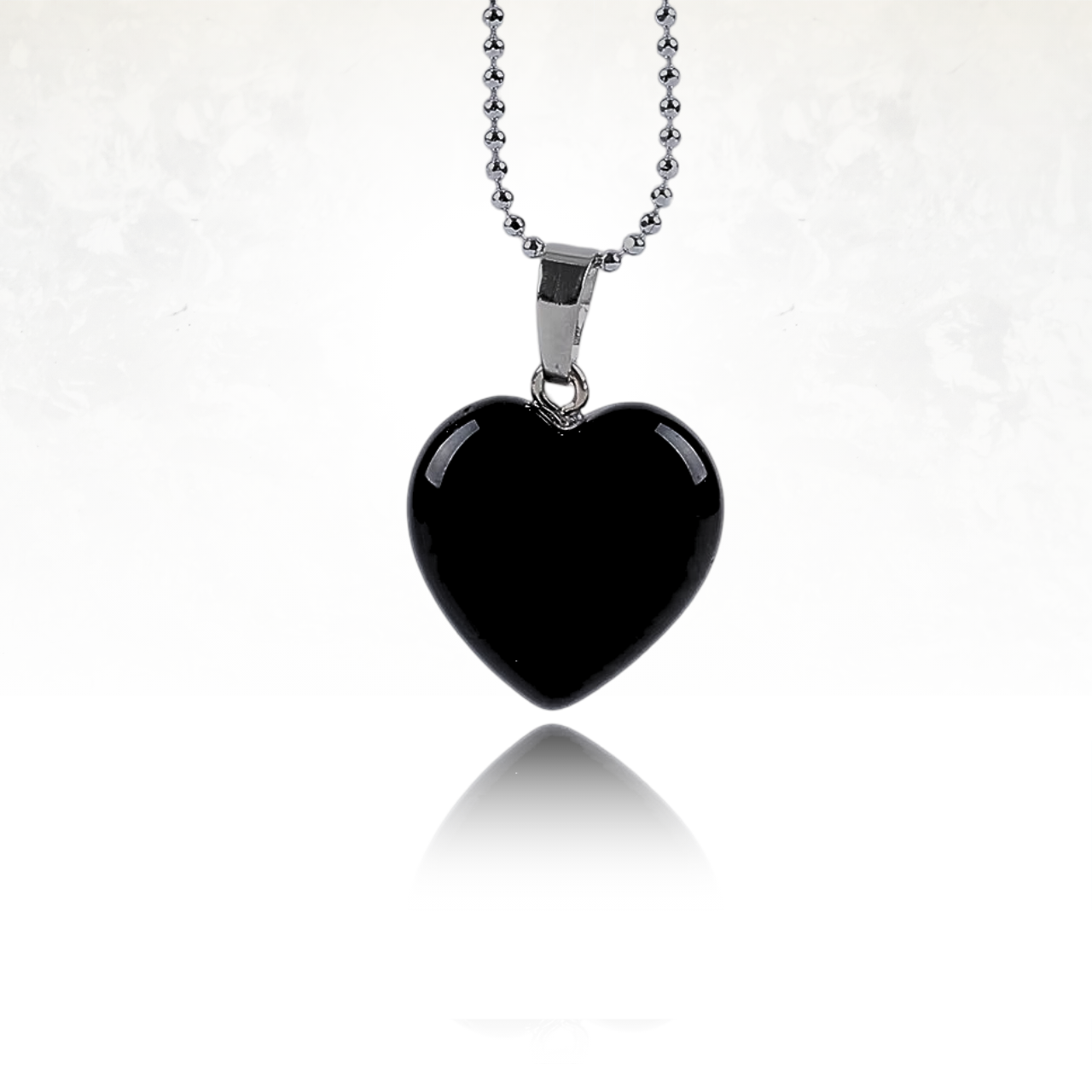 Pendentif cœur en pierre naturelle, idéal pour un cadeau symbolique.