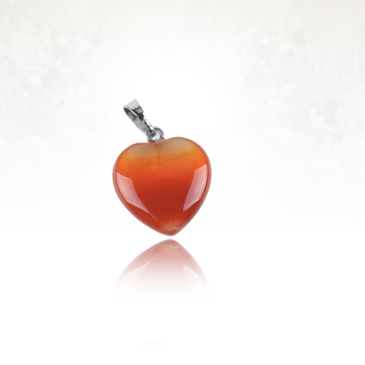 Bijou féminin et délicat en pierre naturelle d'agate rouge, représentant l’amour et la sérénité.