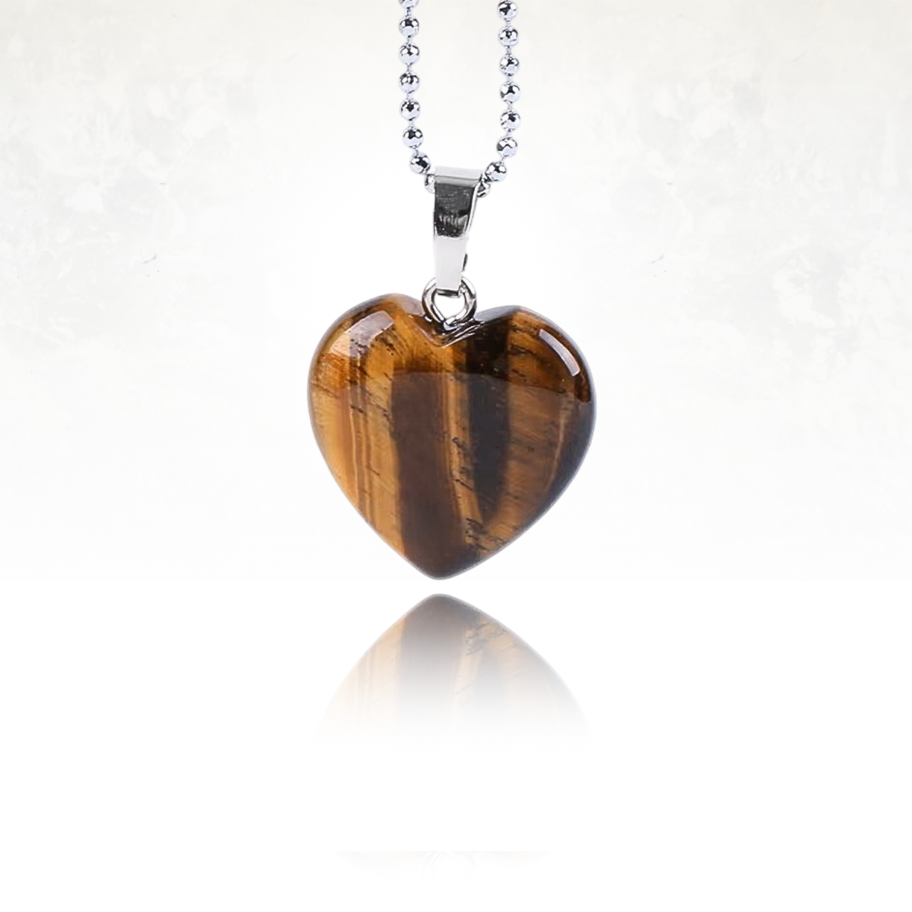 Collier HEART avec un cœur en pierre naturelle aux nuances marro, doré.
