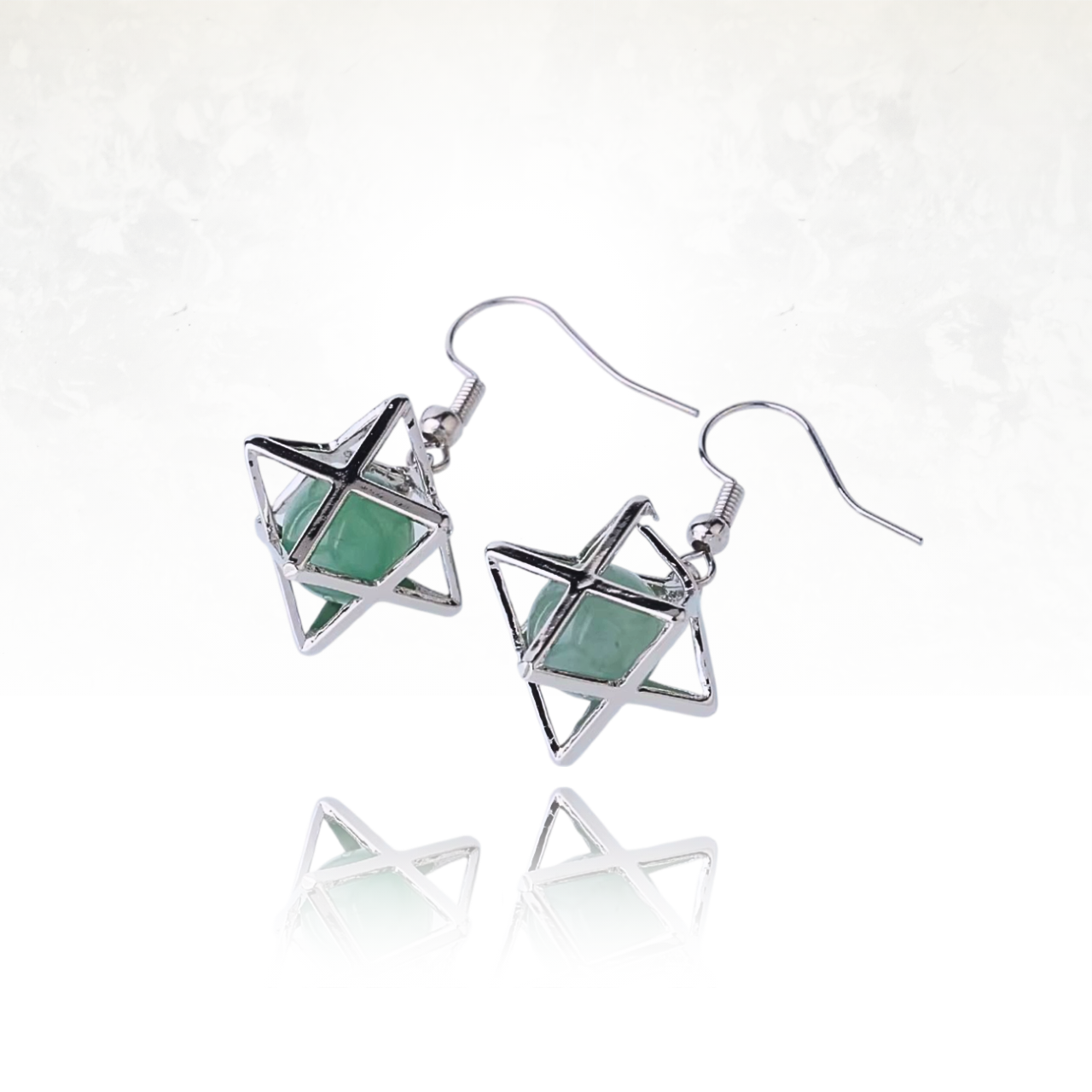 Boucles d'oreilles ésotériques Merkaba en métal argenté et pierre verte.