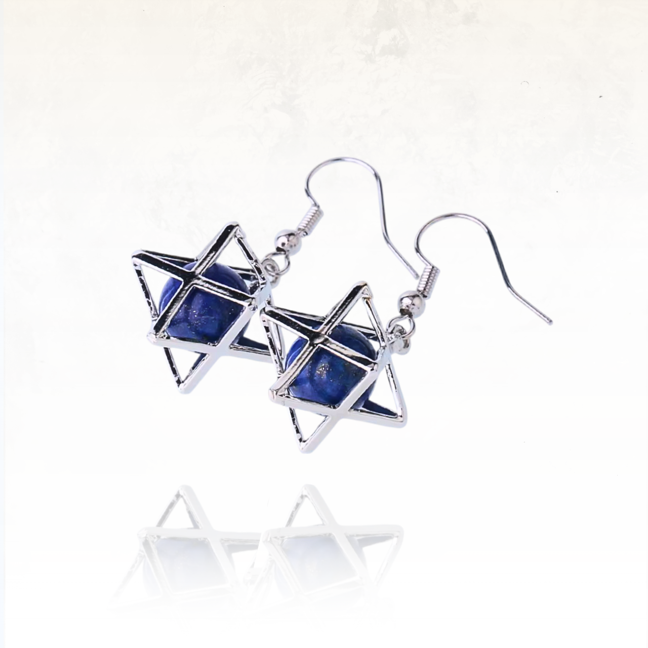Bijoux Merkaba avec structure étoilée et pierre semi-précieuse.