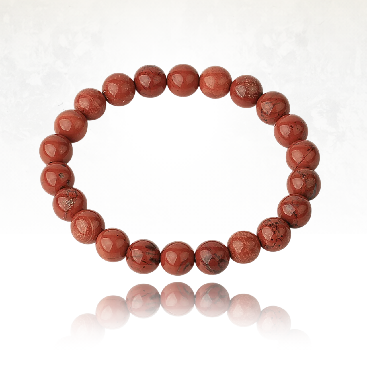 Détail des perles lisses et brillantes du bracelet SALIMA en Jaspe Rouge