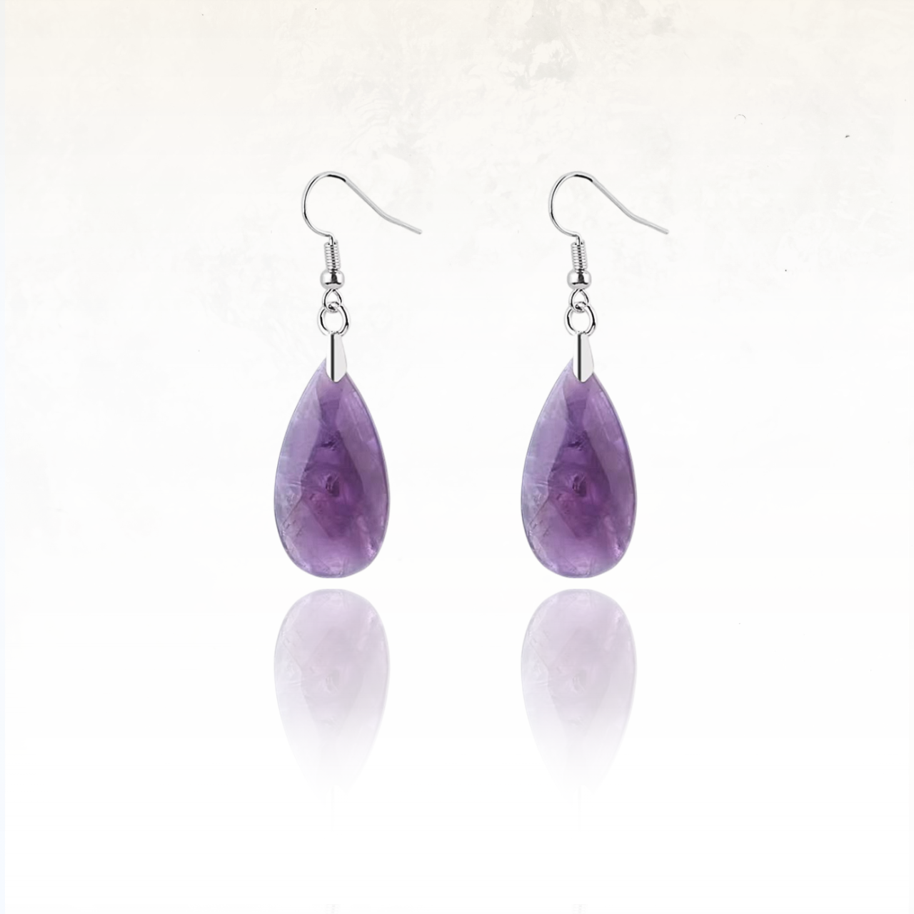 Boucles d'oreilles pendantes en pierre naturelle en forme de goutte.