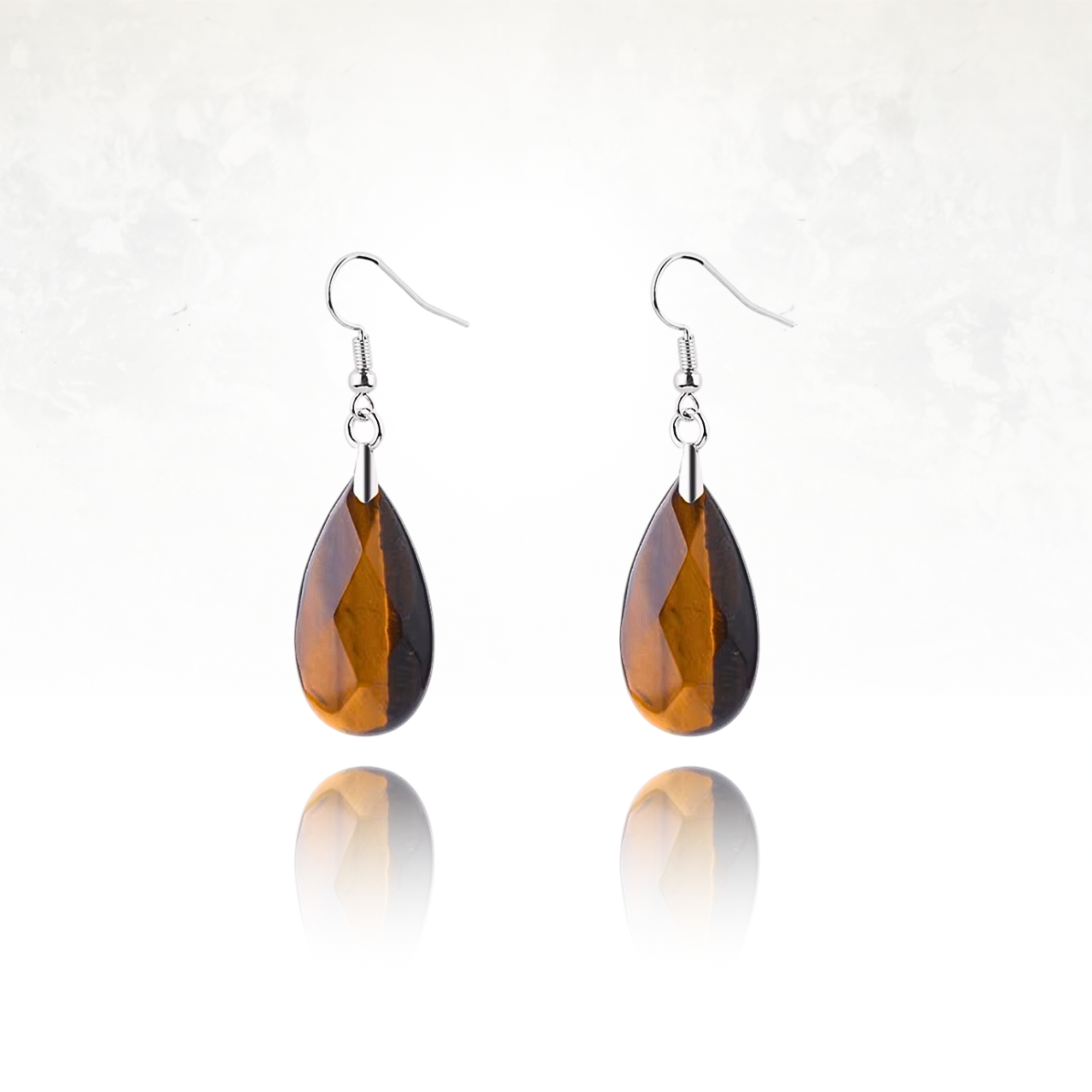 Bijoux bohÚmes avec pierres semi-précieusesaux couelurs doré en forme de goutte.