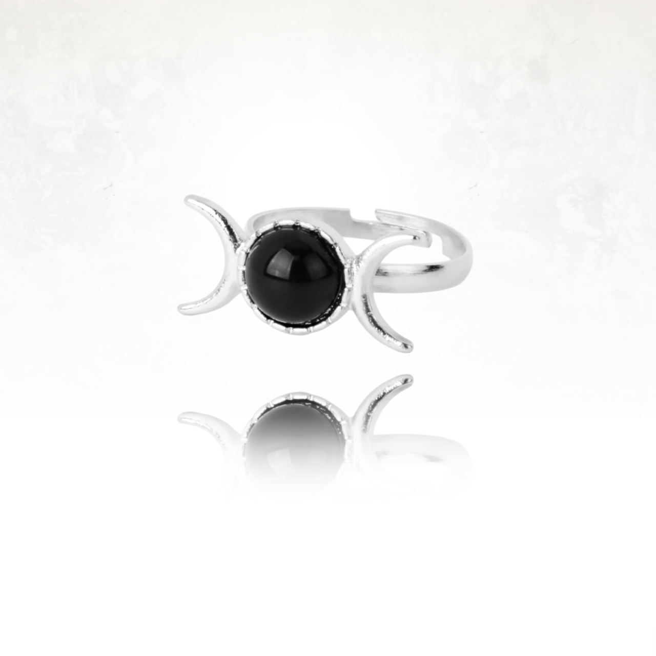 Bague ésotérique enagate noire avec design céleste en métal argenté.