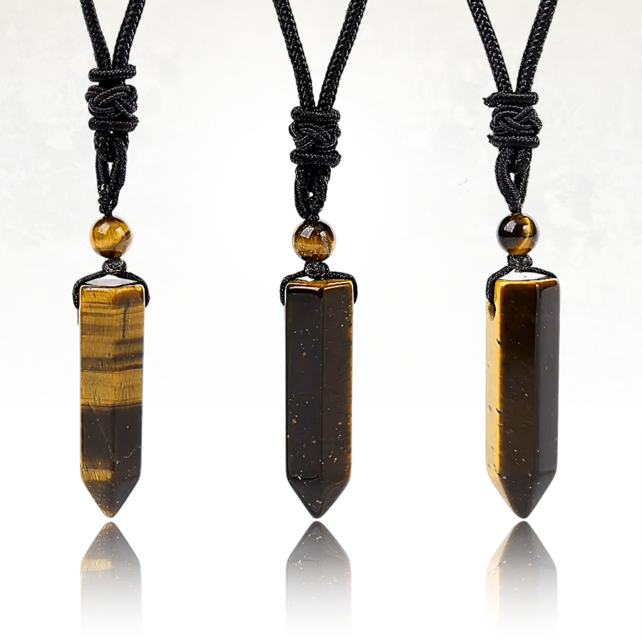 Collier avec pendentif en cristal taillé en pointe pour un look mystique et chic en oeil de tigre