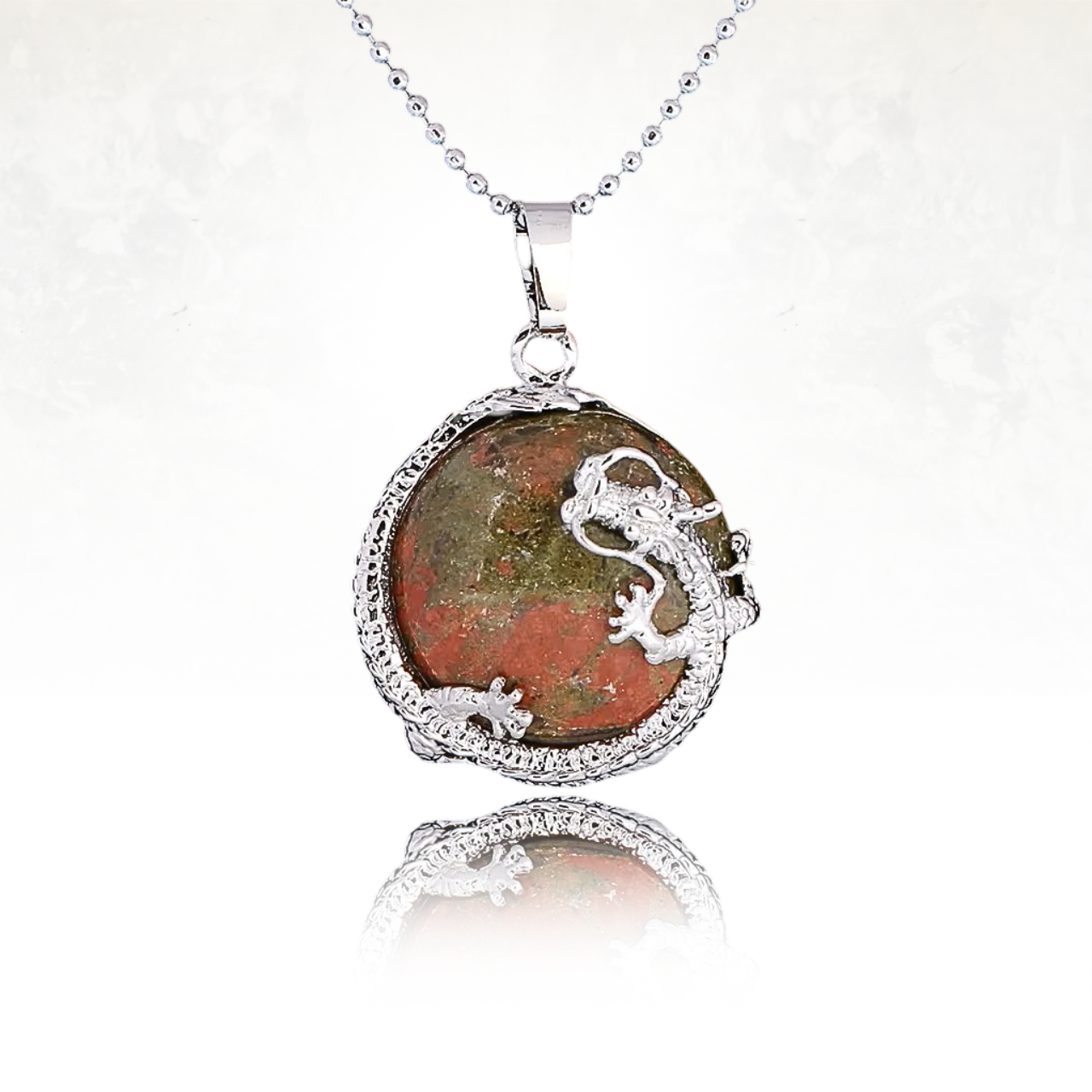 Collier mystique avec pendentif d'unakite et dragon en métal argenté