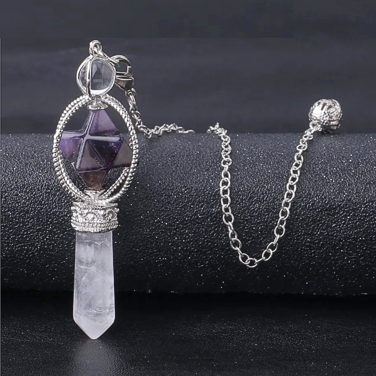 Pendule SINYA en cristal poli avec un Merkaba en amethyste.