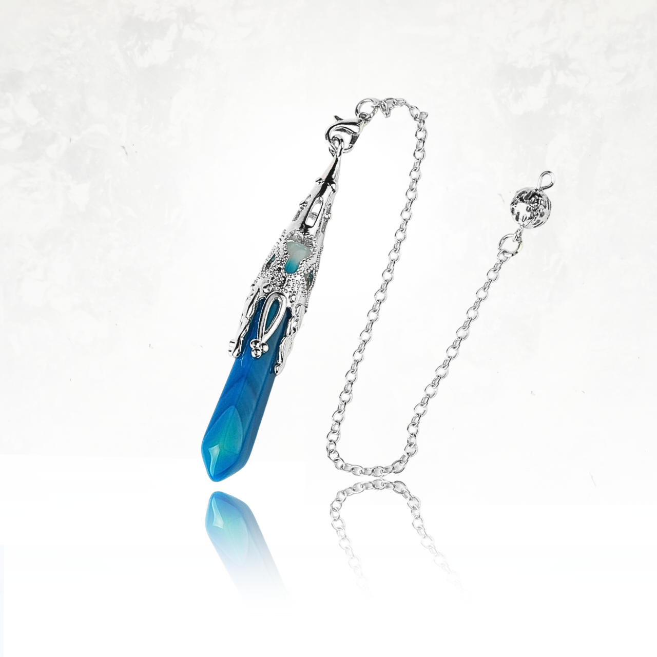 Chaîne de pendule en argent avec embout sphérique ajouré.