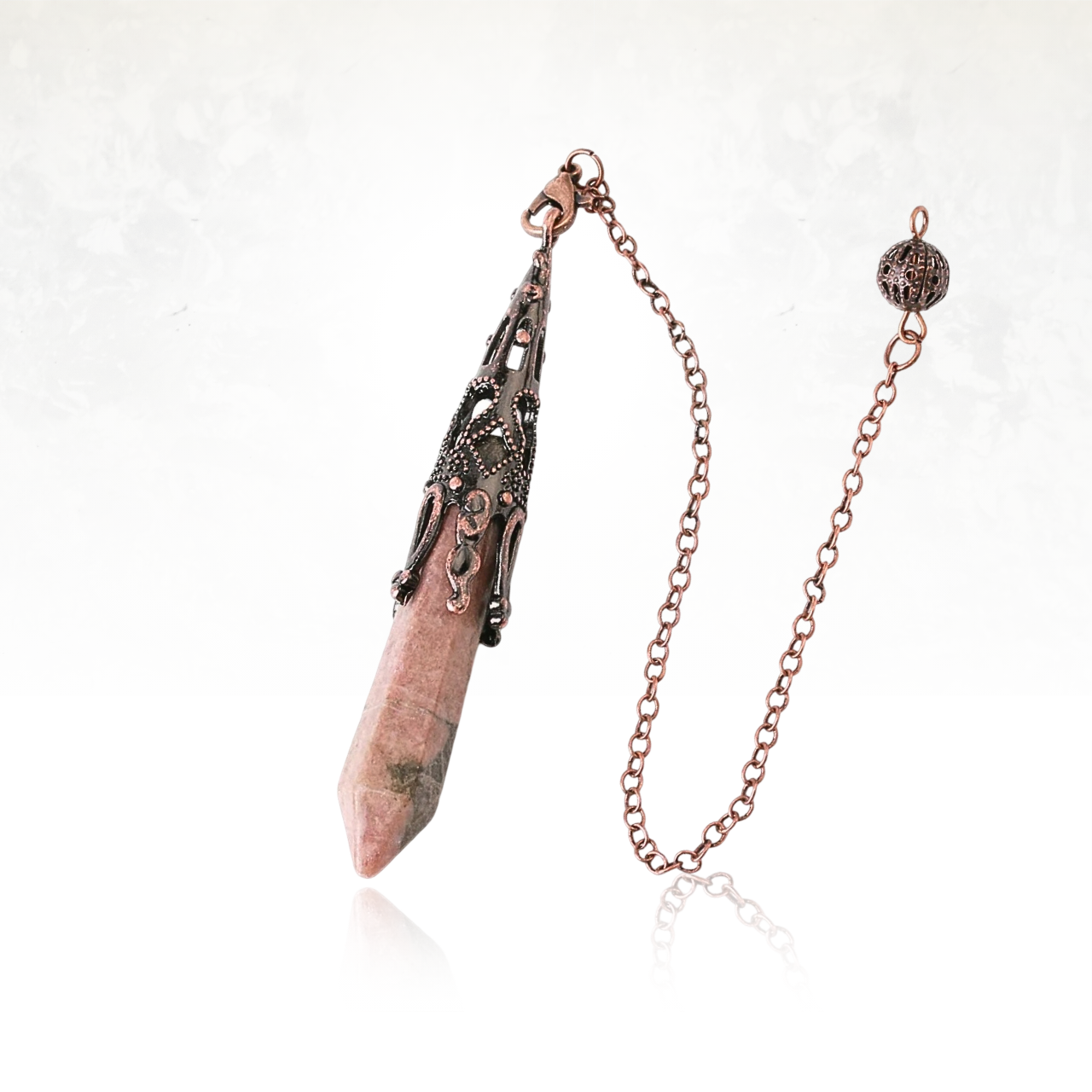 Pendule divinatoire en œil-de-tigre, idéal pour la radiesthésie et la clairvoyance.