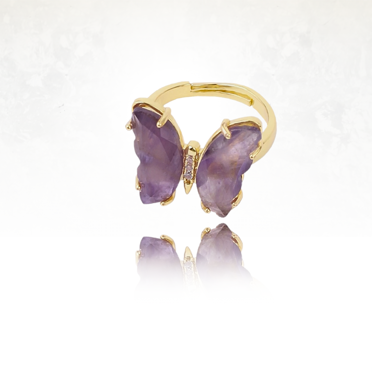Symbole de liberté et de renouveau : bague papillon en pierre naturelle violette, modèle MARIPOSA.