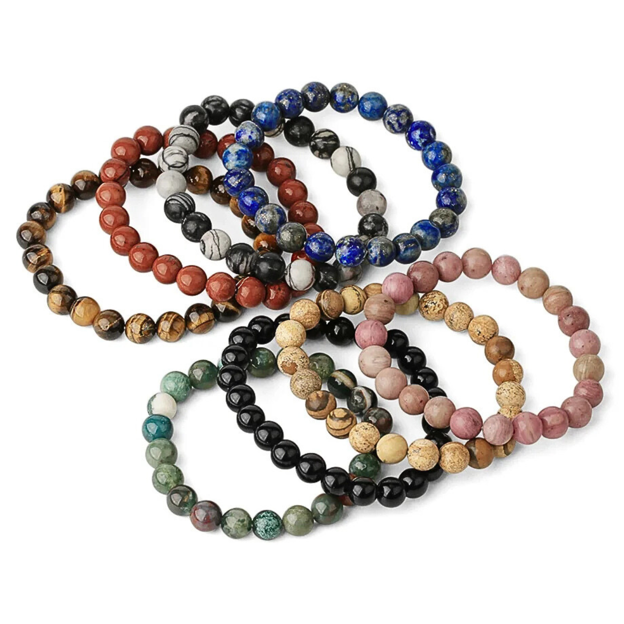 Gros plan sur les bracelets SALIMA, pierres naturelles polies.