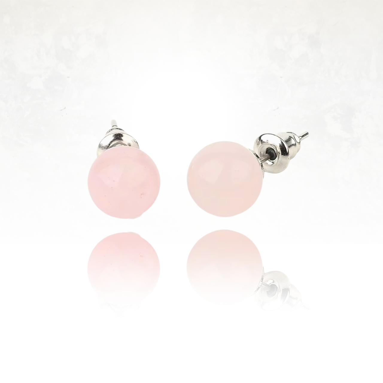 Boucles d’oreilles en quartz rose, parfaites pour un style sobre et raffiné.