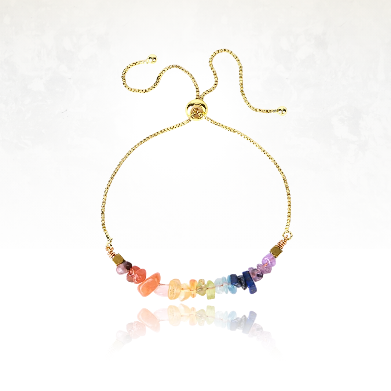 bracelet doré chic et romantique avec des pierres naturelles aux couleurs des 7 chakras