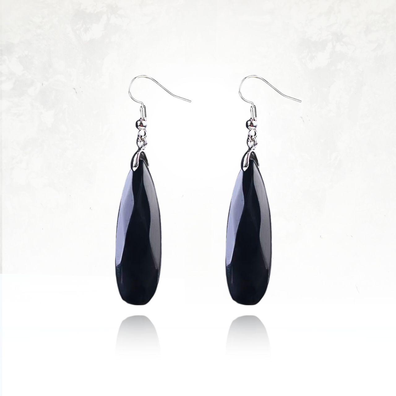 Accessoire chic et intemporel en pierre semi-précieuse noire.