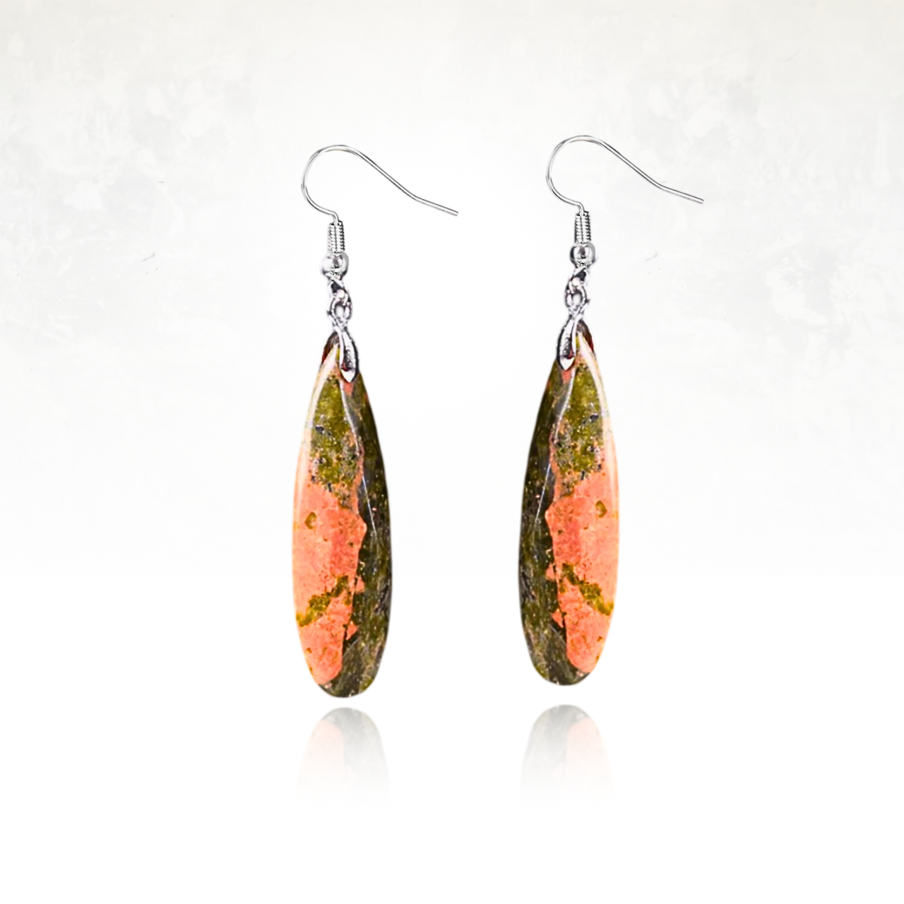 Boucles d'oreilles facettées en unakite pour une touche sophistiquée.