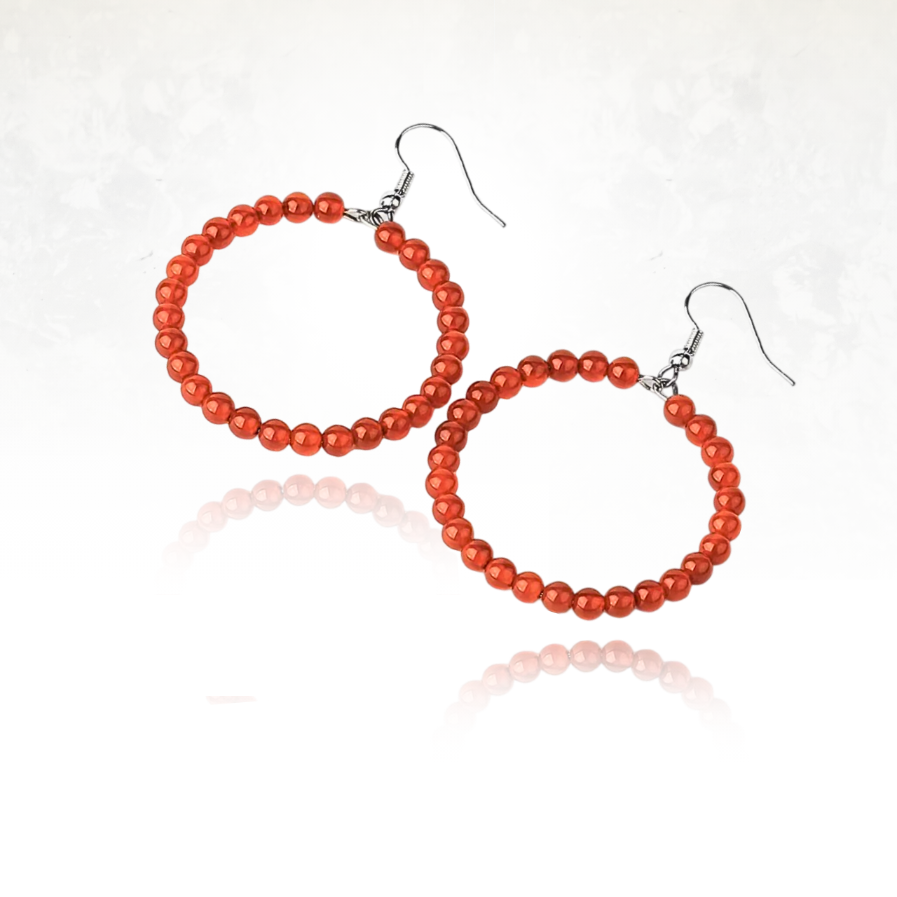 Accessoires féminins en agate aux tons rouges