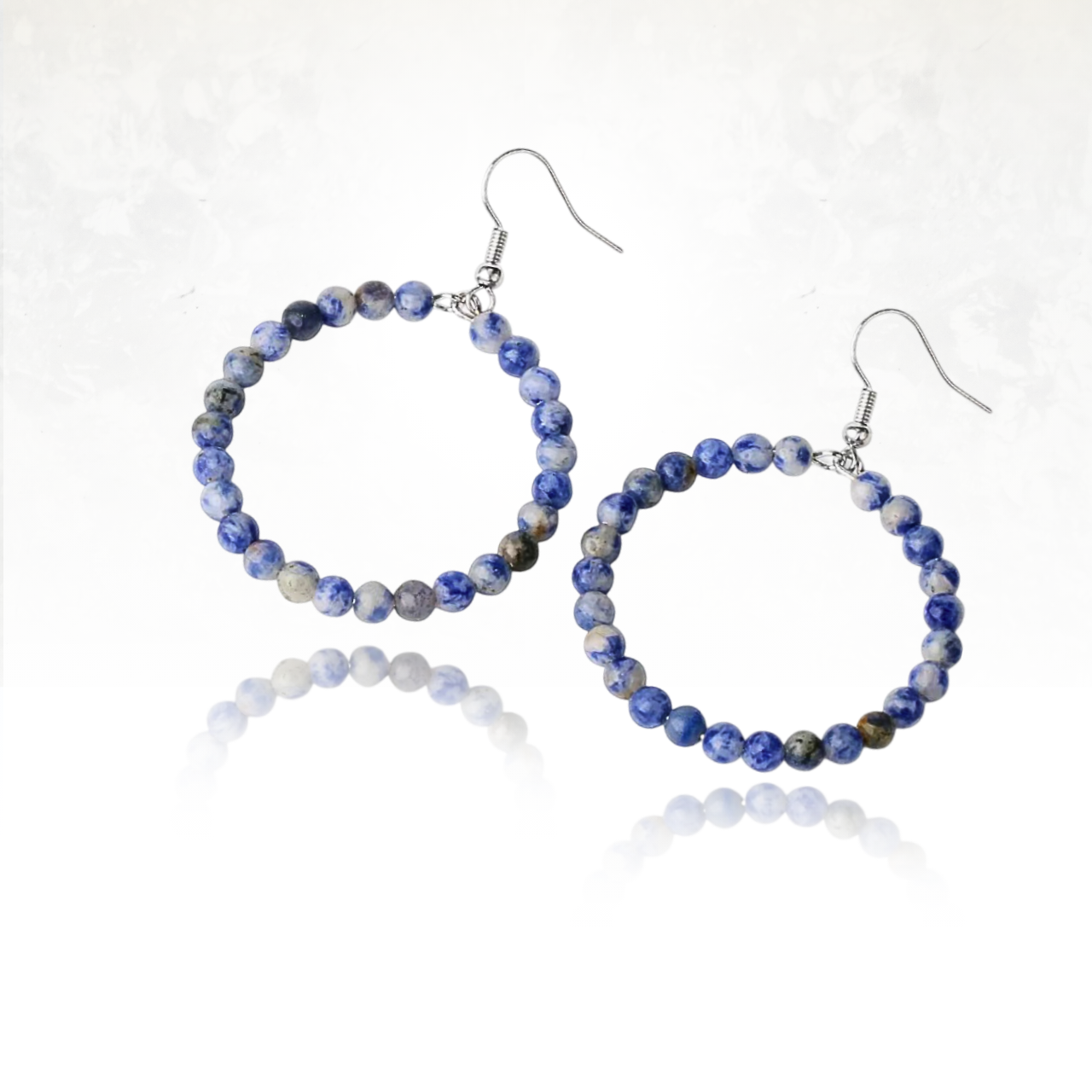 Boucles dâoreilles vibrantes en sodalite bleu et blanc