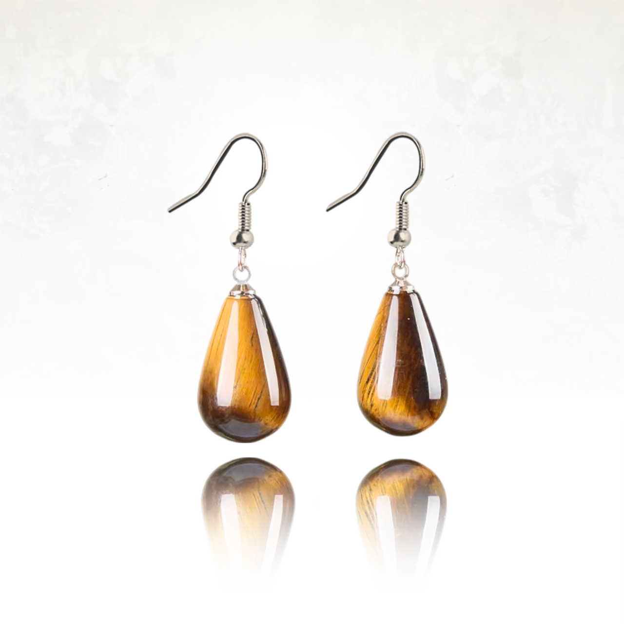Accessoires Ă©lĂ©gants en pierre Ćil de tigre pour un style naturel et raffinĂ©.