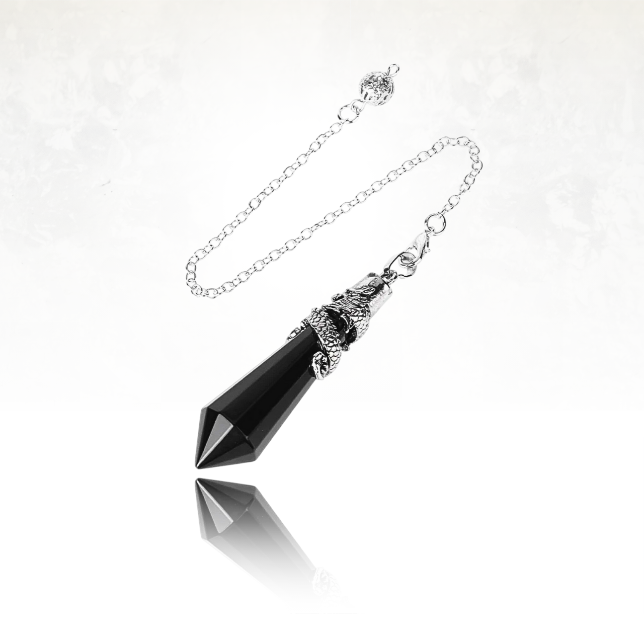 Pendule AIMKI en cristal d'obsidienne, parfait pour la méditation et l’harmonisation des énergies.

