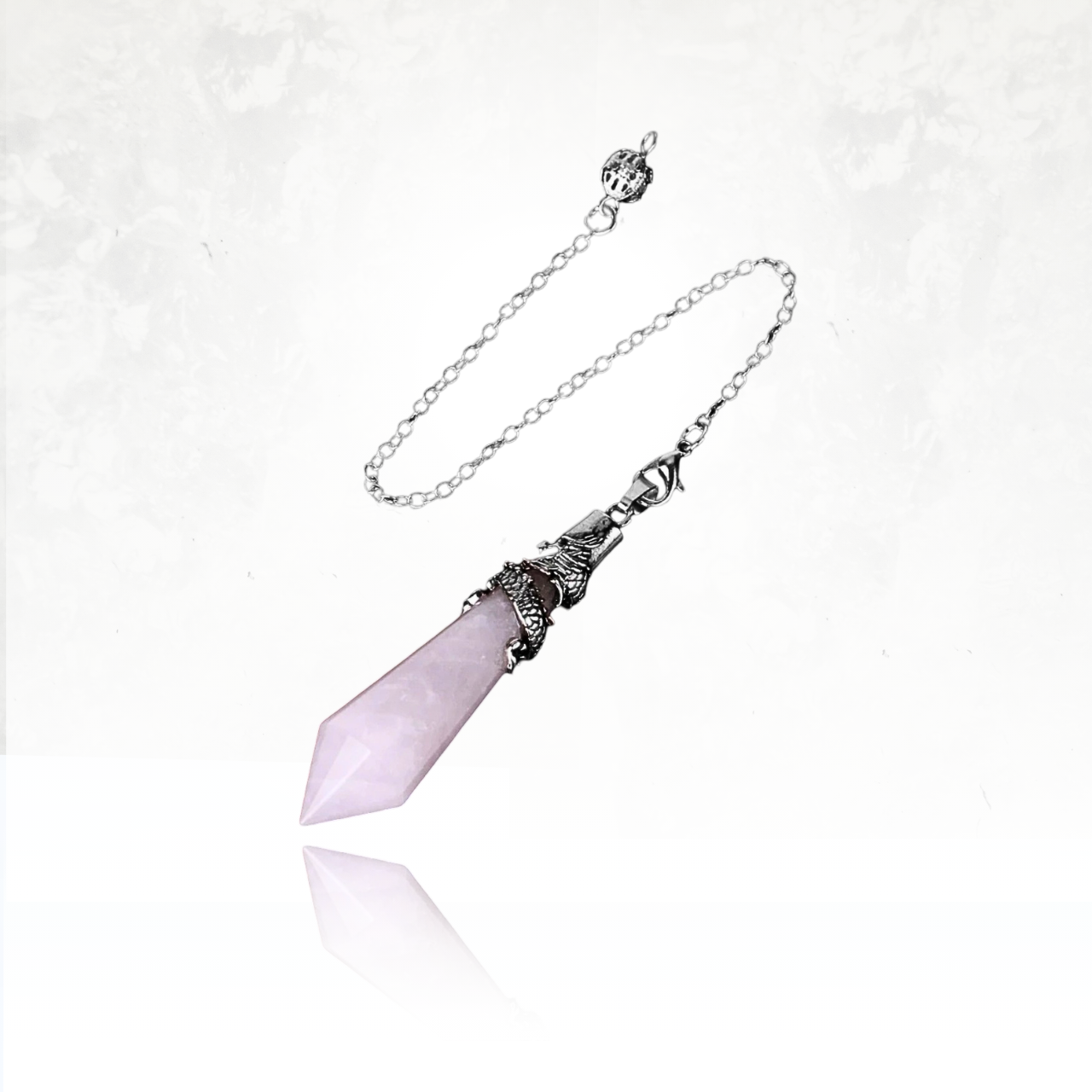 Pendule divinatoire en pierre naturelle DE QUARTZ ROSE, idéal pour la radiesthésie.

