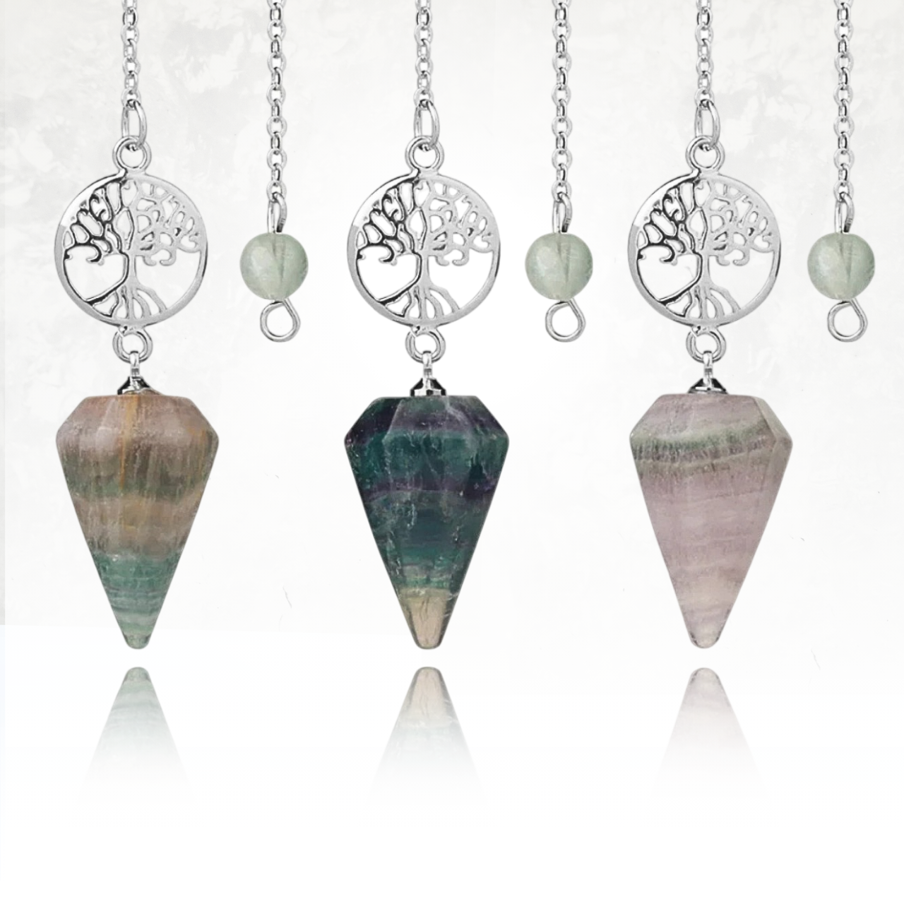 Pendule ARBOL en pierre minérale avec chaîne et perle assorties.