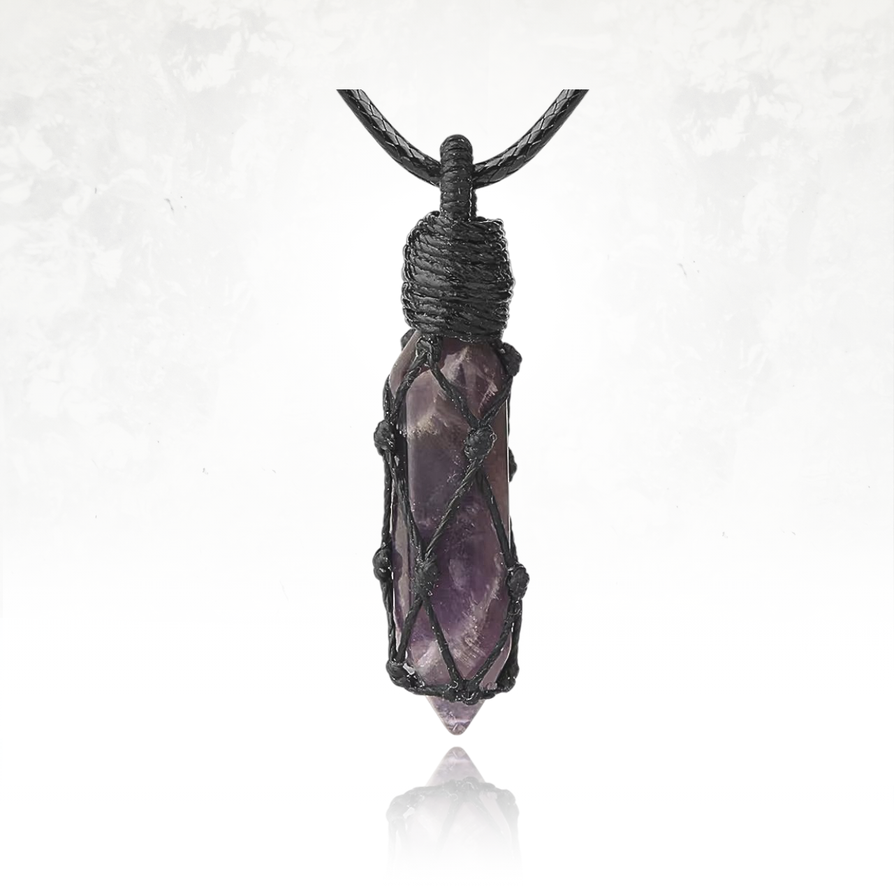 Pendentif en amethyste, favorisant la communication et l’expression.

