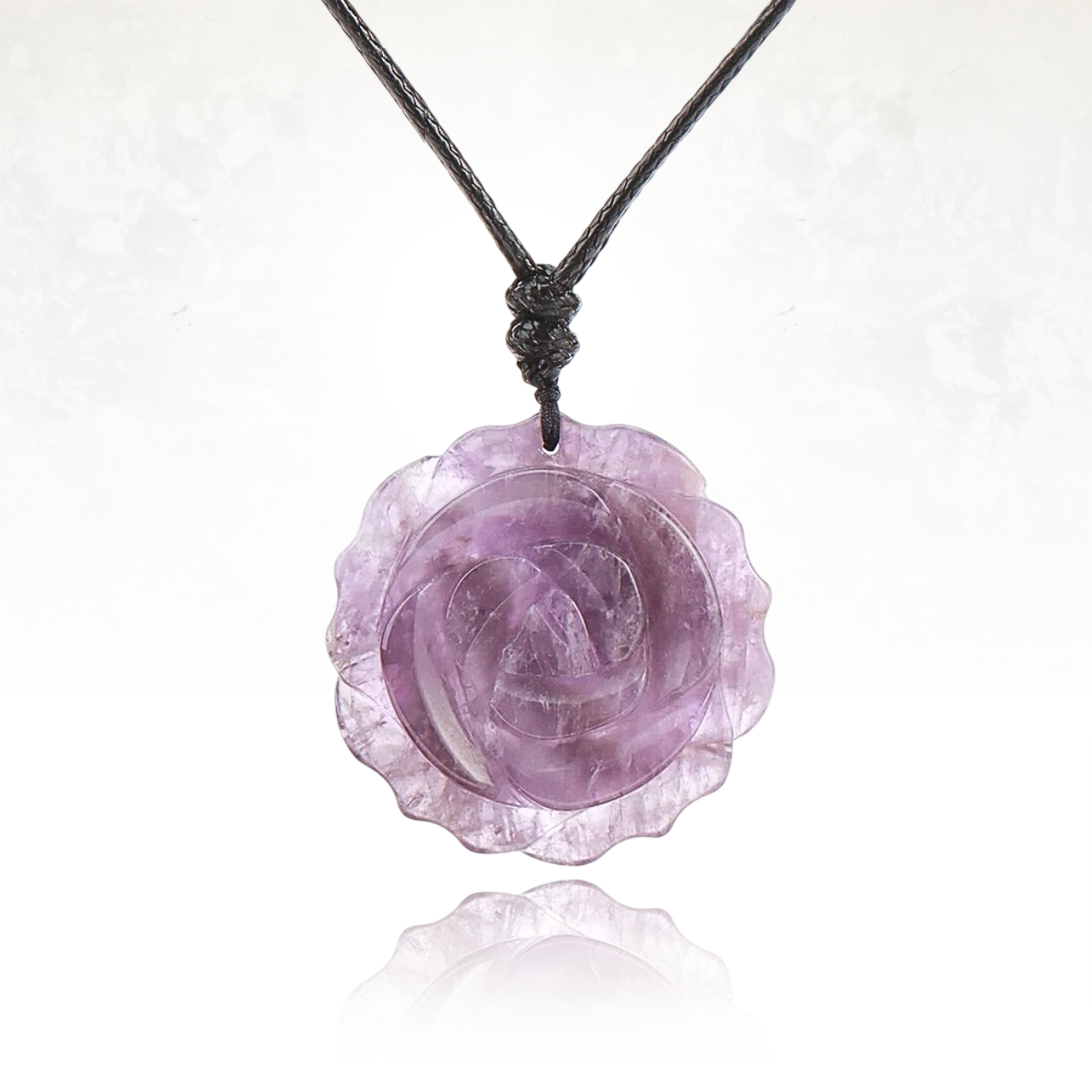 Collier artisanal FEMINA avec pendentif en pierre sculptée d'amethyste

