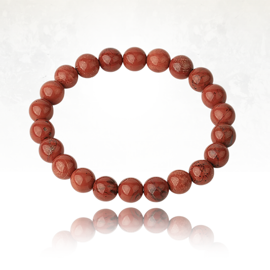Détail des perles lisses et brillantes du bracelet SALIMA en Jaspe Rouge