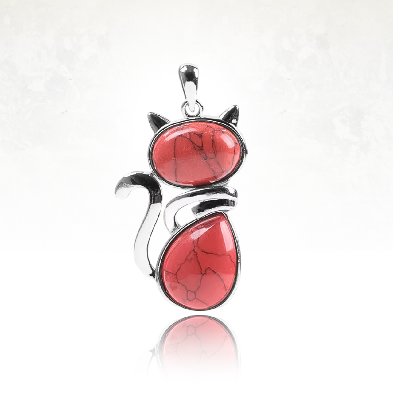 Bijou raffiné en argent avec pendentif chat en jasperouge.

